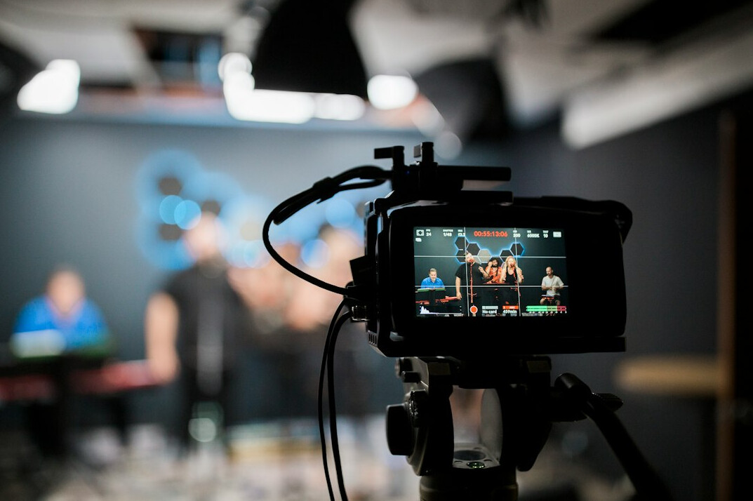 videographer filming interview
