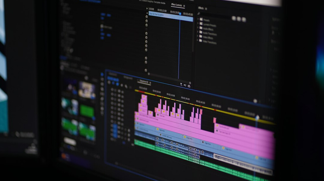 filmmaker editing video on computer